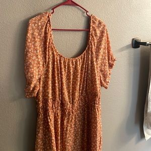 Floral dress, cinched at waist